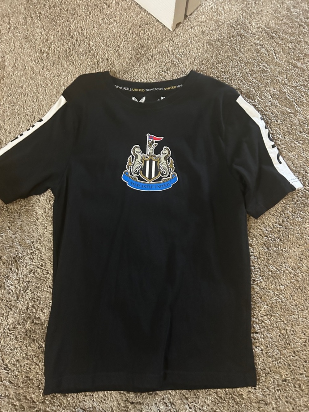 Newcastle United Kids' Black Crest Short Sleeve Tee
